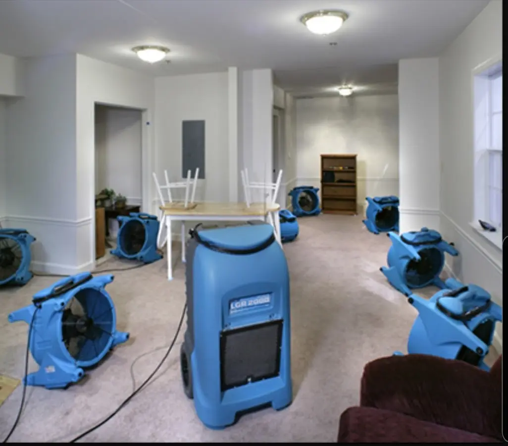 Air movers and dehumidifier setup for Water Extraction & Removal in Paxton